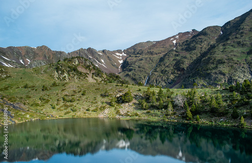 Mountain lake Estany de les Truites in Andorra Pyrenees, La Massana, refugi de coma pedrosa © olly_plu