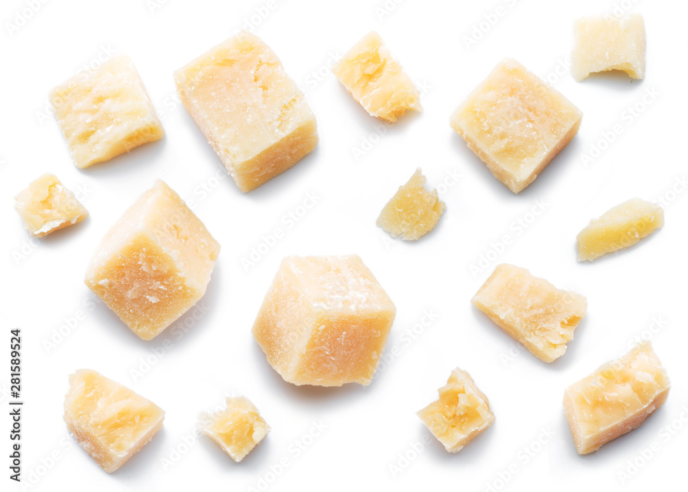 Parmesan cheese cubes and parmesan crumbs isolated on white background.