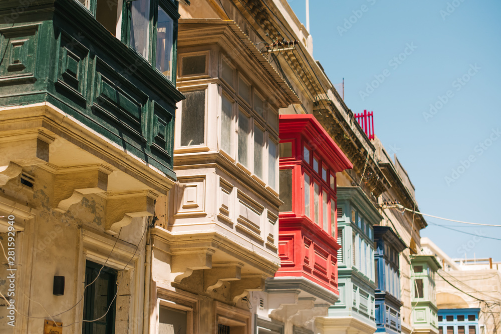 colored balconies on buildings in  mdina malta