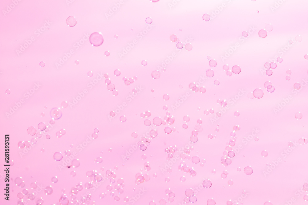 soap bubbles on a pink background