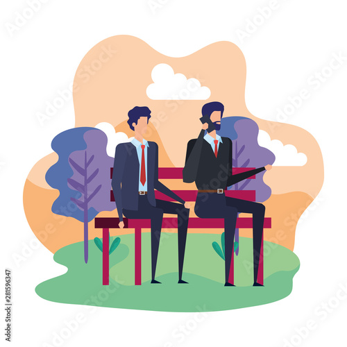 elegant businessmen calling with cellphones in the park chair