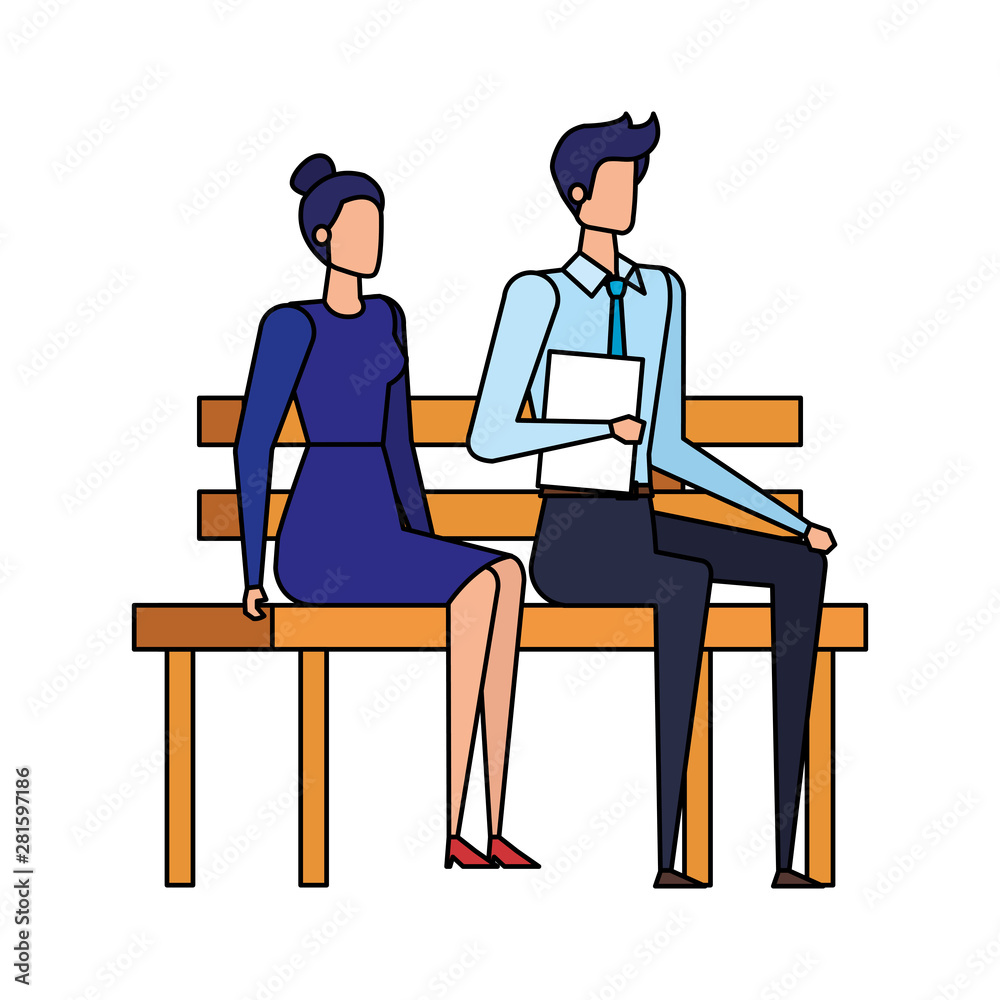 elegant business couple seated in the park chair