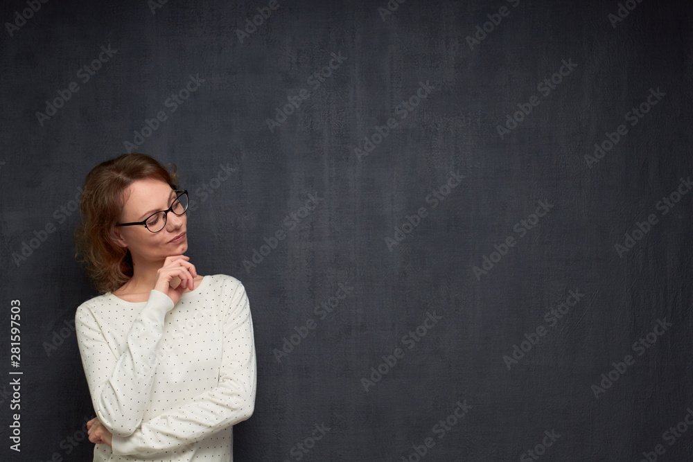 Portrait of thoughtful girl looking at something interesting Portrait of thoughtful girl looking at something interesting