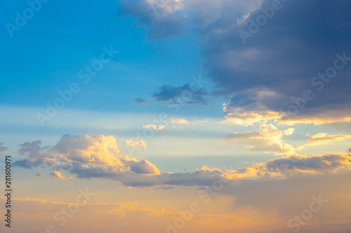 Pink vanilla heaven. Bright blue sky with gentle cumulus clouds. soft pastel colors