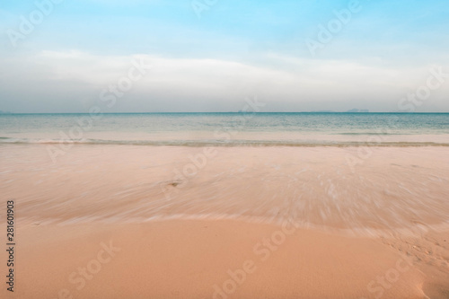 beautiful golden beach and blue sky in afternoon time background wallpaper