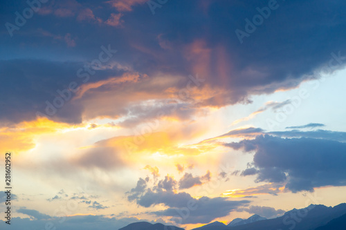 soft sunset sky. pink and gold clouds. High mountains. Natural background.