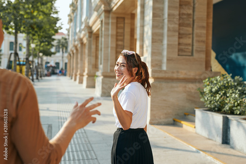 Konstfotografi Young asian woman good bye to boyfriend, freedom lifestyle and relaxation on hol