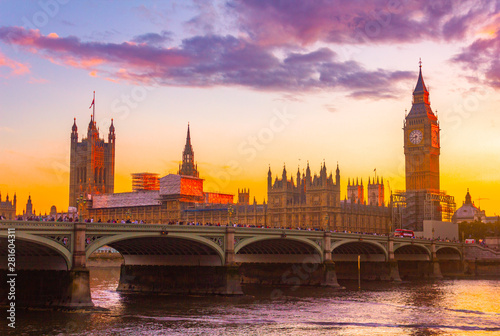 London Parliament big ban tower at sunset with bridge and Thames river