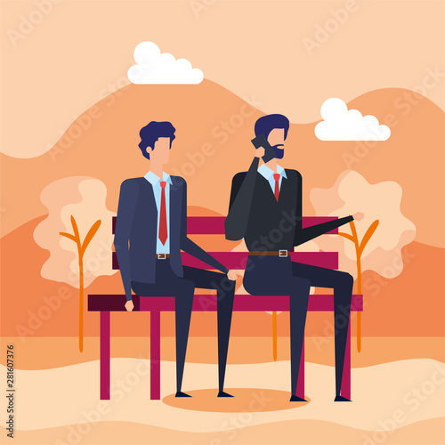 elegant businessmen calling with cellphones in the park chair