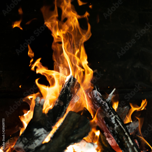 fire flames in bonfire stove isolated with balck