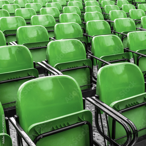 Empty plastic green chairs
