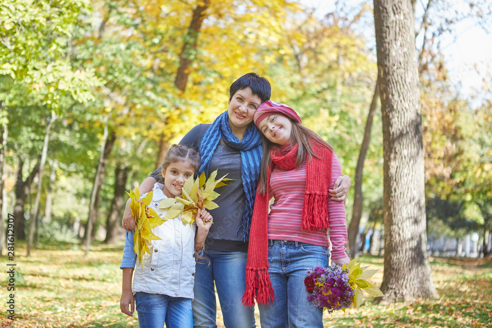 Fototapeta premium Happy family. Loving mother and two daughter