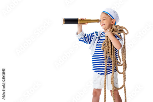 Foto smiling preschooler child in sailor costume looking in spyglass and holding rope