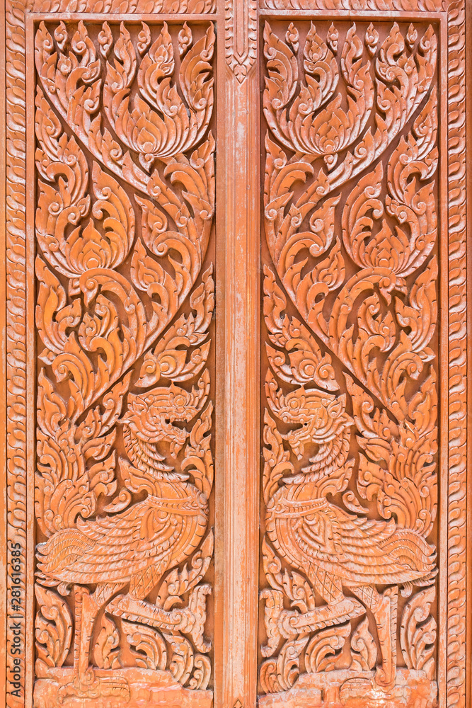 Bird carved wooden door.