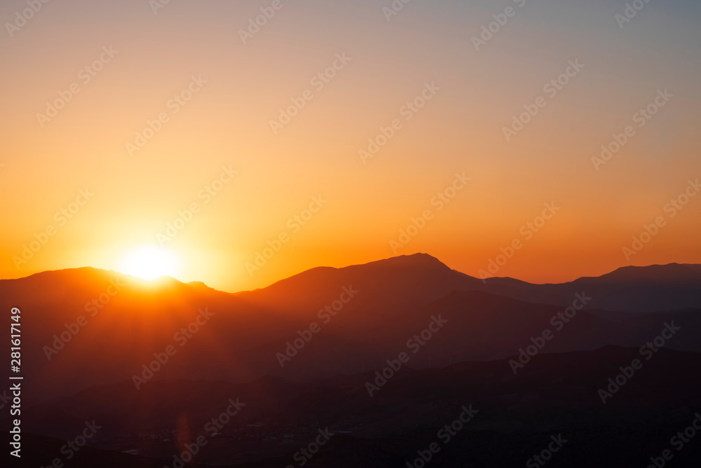 Beautiful landscape, golden sunset over the mountains. View from Nemrut Mountain, Turkey.