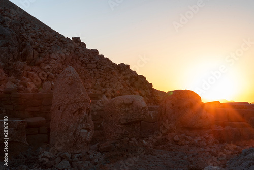 Ancient statues on the Nemrut mountain and most beautiful sunset. Unesco heritage. Nemrut, Turkey, 