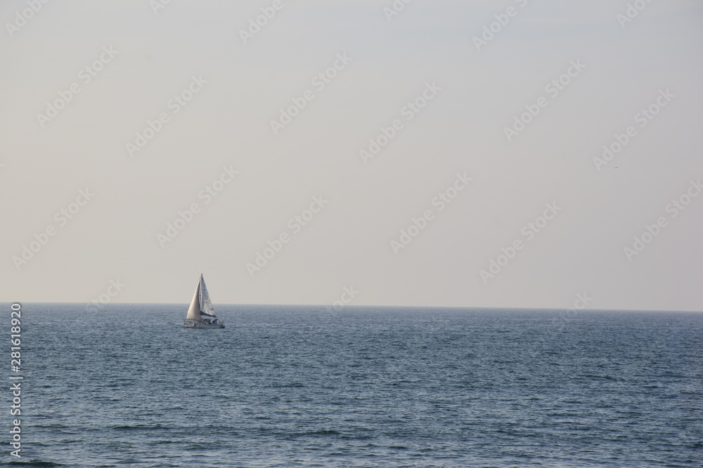 Lone boat sailing in the sea