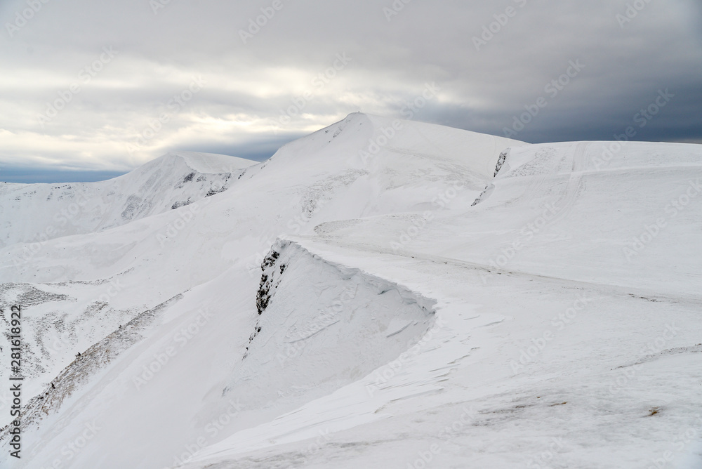 freeride skiers in mountains
