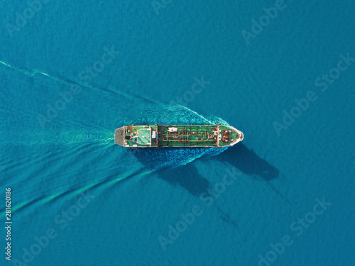 Aerial top view Oil ship tanker transportation oil from refinery on the sea.