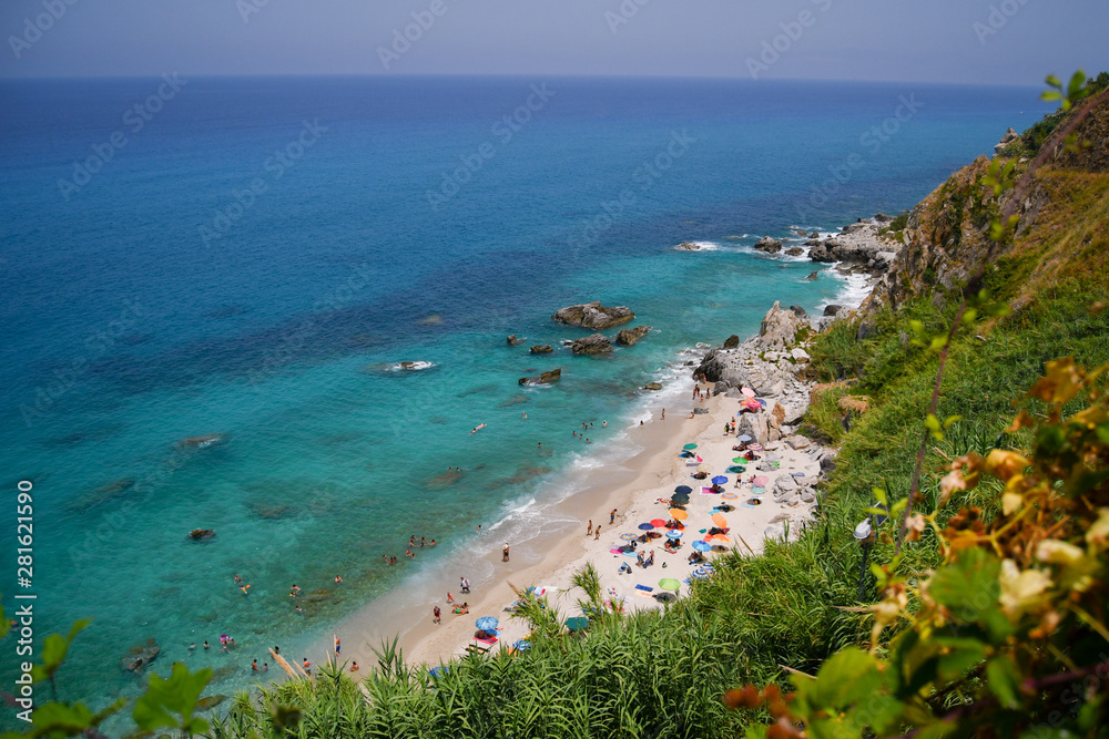 Panoramic view on turquoise sea of the mediterranean coast of the south of Italy