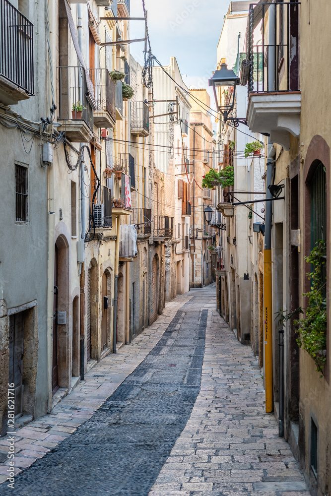 Narrow street in Tarragona, Catalonia, Spain