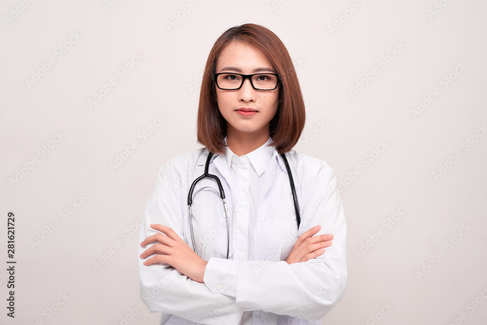 Fototapeta premium Cheerful happy doctor with crossed hands on white background