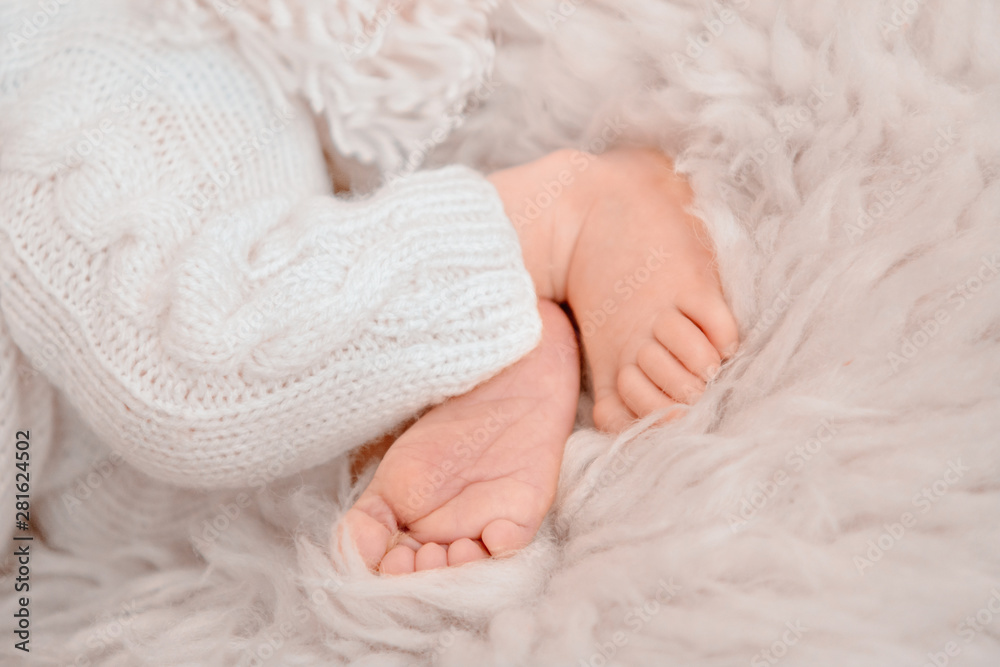 Photo of newborn baby feet, soft focus. Photo of newborn baby feet, soft focus.