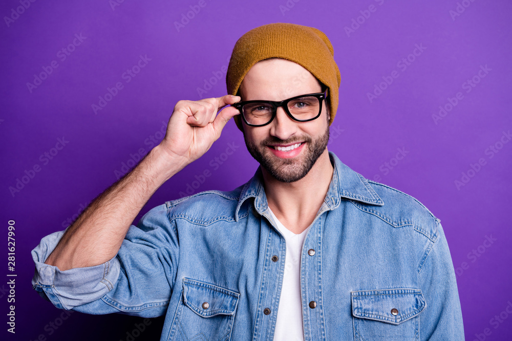 Close-up portrait of his he nice attractive content cool cheerful cheery positive bearded guy touching specs laser sight correction isolated over bright vivid shine violet lilac purple background Close-up portrait of his he nice attractive content cool cheerful cheery positive bearded guy touching specs laser sight correction isolated over bright vivid shine violet lilac purple background