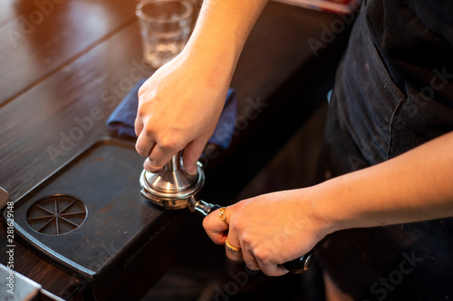Close up of Barista hand is preparing coffee in coffee shop