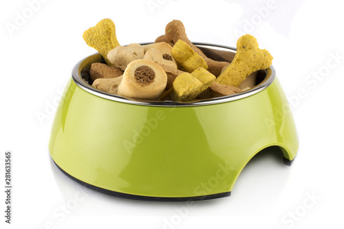 Green bowl methacrylate food treats container for dog or cat with food. Isolated on white background. photo