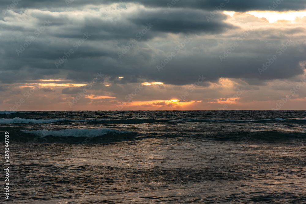 Sunrise on the ocean in Waipouli Coast, Kauai, Hawaii Sunrise on the ocean in Waipouli Coast, Kauai, Hawaii