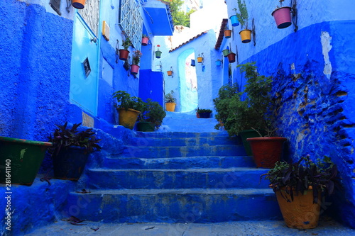 Fototapeta Naklejka Na Ścianę i Meble -  Blue street walls of the popular city of Morocco, Chefchaouen. Traditional moroccan architectural details.