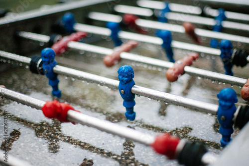 Close up of table soccer football in the rain
