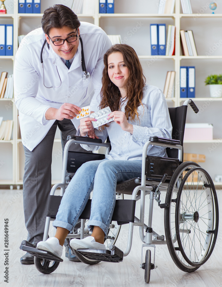 Disabled patient on wheelchair visiting doctor for regular check Disabled patient on wheelchair visiting doctor for regular check
