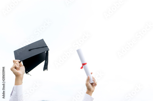 graduation young man show cap and gown photo