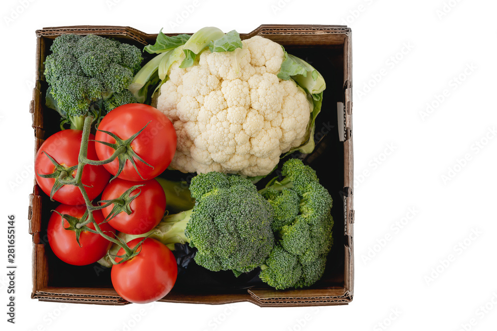 Tomatoes, Cauliflower and Broccoli in Container Close Up, Isolated on White Background. Fresh Organic Vegetables, Healthy Eating, Harvesting, Product Tomatoes, Cauliflower and Broccoli in Container Close Up, Isolated on White Background. Fresh Organic Vegetables, Healthy Eating, Harvesting, Product