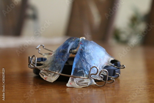 Orthodontic device on a wooden table
