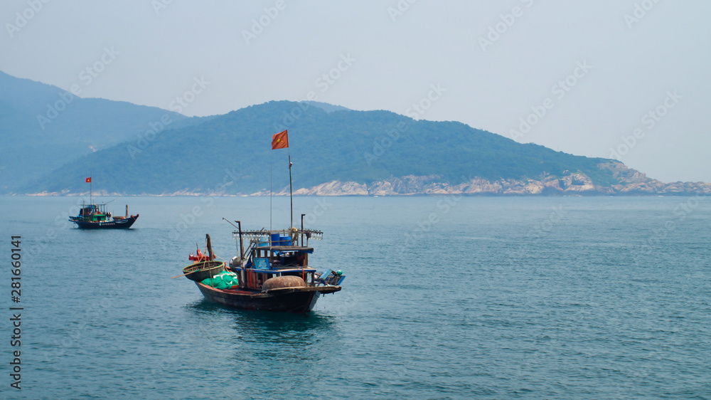 The fishing boats are waiting for the night fishing. Vietnam Hoi An, Da Nang Cu Lao Cham The fishing boats are waiting for the night fishing. Vietnam Hoi An, Da Nang Cu Lao Cham