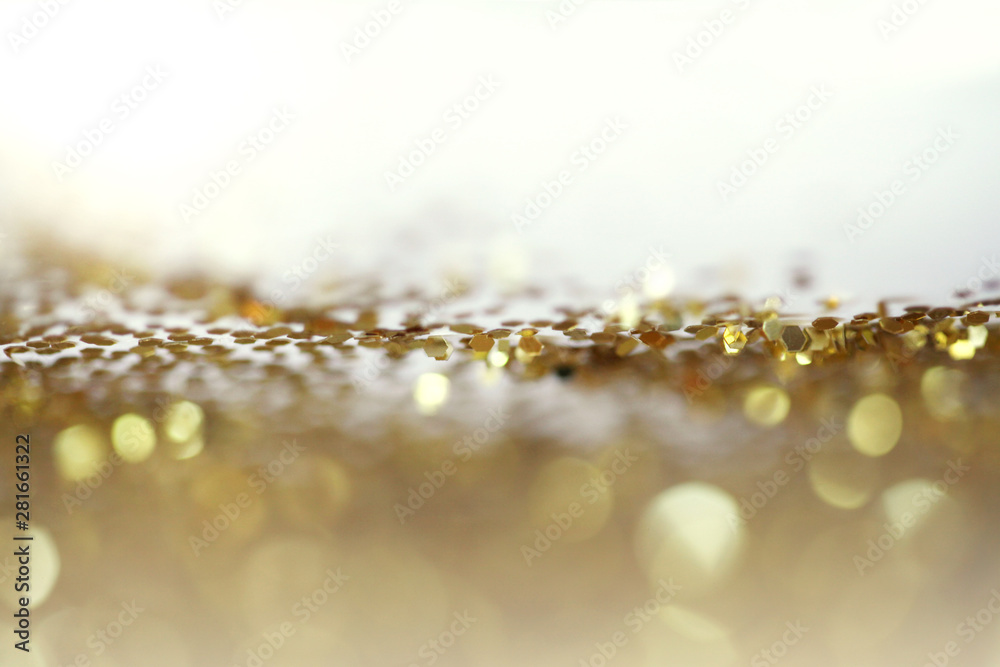 Gold (bronze) glitter shine dots confetti. Abstract light blink sparkle defocus backgound. Gold (bronze) glitter shine dots confetti. Abstract light blink sparkle defocus backgound.