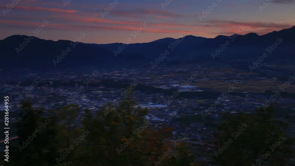 Ueda city and mountains seen from Komaki Castle at sunrise, Japan Ueda city and mountains seen from Komaki Castle at sunrise, Japan