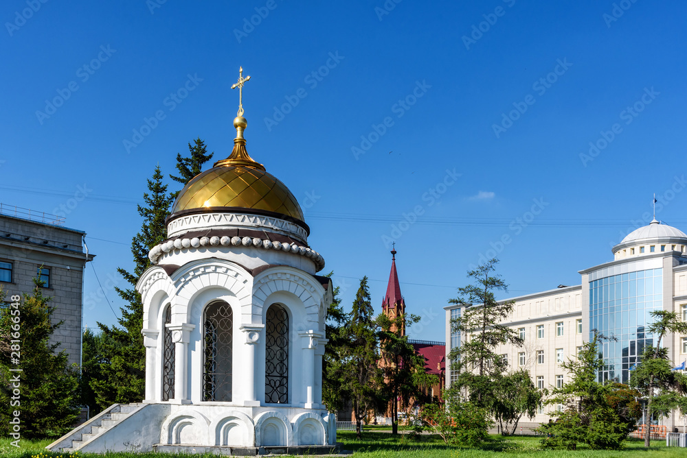 Russia, Irkutsk - July 7, 2019: Chapel-monument on the site of the destroyed cathedral in the name of the Kazan Icon of the Mother of God and Organ Hall