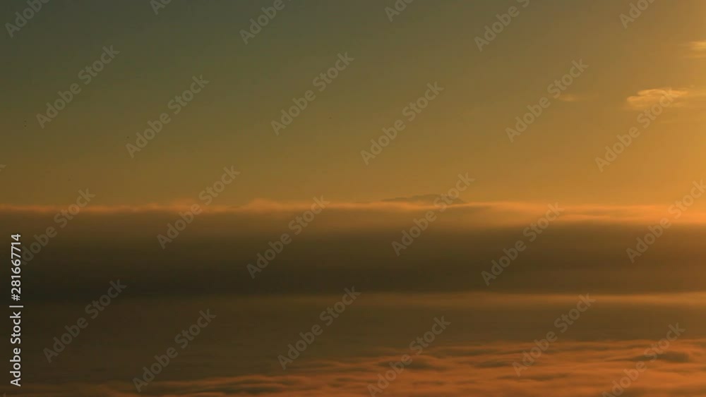 Panning shot of Mount Asama in clouds at sunrise, Japan Panning shot of Mount Asama in clouds at sunrise, Japan
