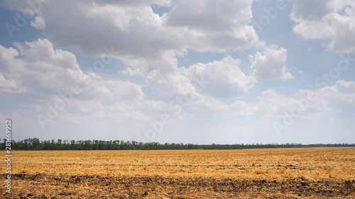 Car side window view driving around a flat landscape countryside. Agriculture. Movement along