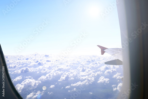 Sunlight and skyline from airplane window view use for wallpaper background and web design.