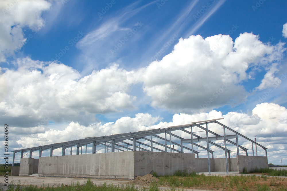 Metal construction on a concrete base. Construction of prefabricated buildings and structures for agriculture. Metal construction on a concrete base. Construction of prefabricated buildings and structures for agriculture.