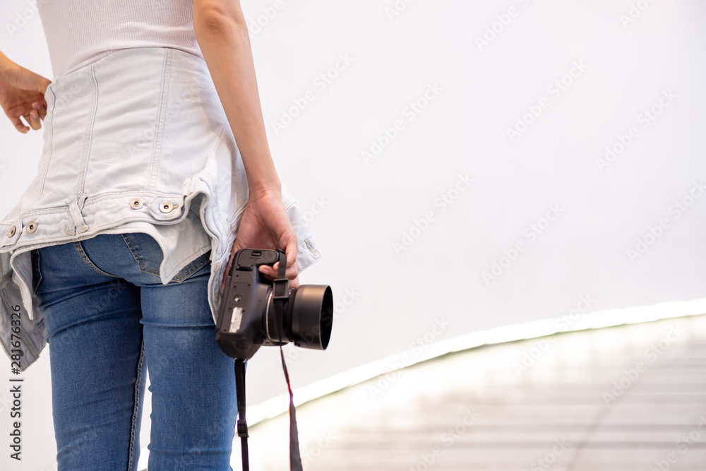 A beautiful young photographer with photographs in the city and in different angles. Other, shapely girl, teen A beautiful young photographer with photographs in the city and in different angles. Other, shapely girl, teen
