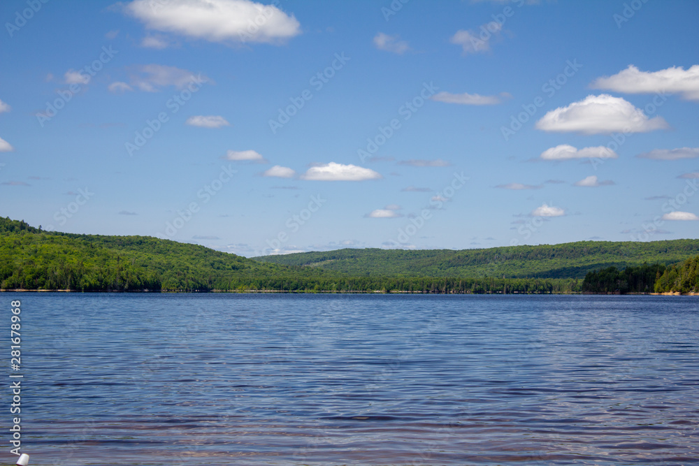 landscape with lake and blue sky