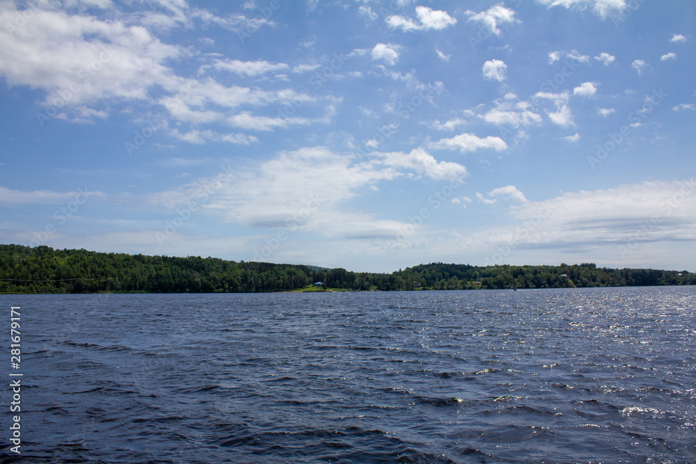 landscape with lake and blue sky landscape with lake and blue sky