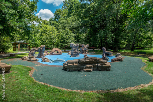 Playground with outdoor themed structures