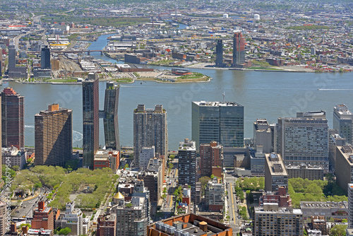 New York City East River. Urban view with skyscrapers. United States